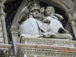 Mary and the Child, Jesus. Statuary on the facade of the Duomo, The Basilica di Santa Maria del Fiore, Florence, Italy, 2012, taken by Martha M Wiggins